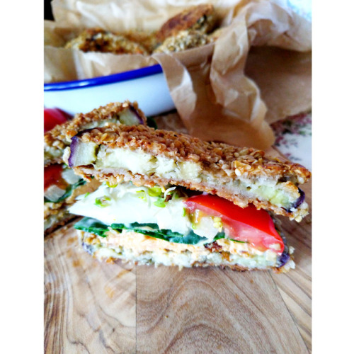 Breaded aubergine as a burger - with chickpea flour then covered with sesame seed, chopped nuts and 