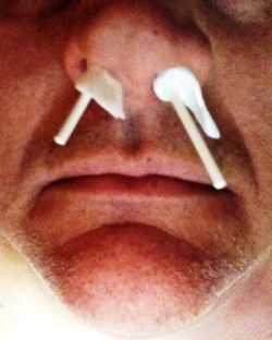 the-company-of-men:  I PRACTICE WHAT I PREACH…POPPER HAZE “DOUBLE BARREL” STYLE Here is a closeup of your Company of Men author, horny as hell with two popper-soaked (BOLT) cotton swabs shoved up his snoot for a constant supply of vapor-licious