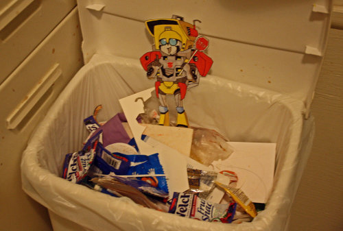 Wreck-Gar Is On Top Of Trash, Then Surrounded By Stuff.