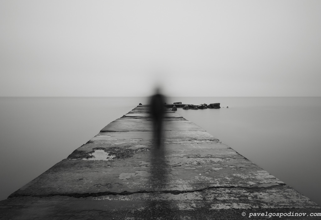 nomadsclub:  A MAN WALKING ON A PIER A man walking on a pier, Balchik, Bulgaria ISO