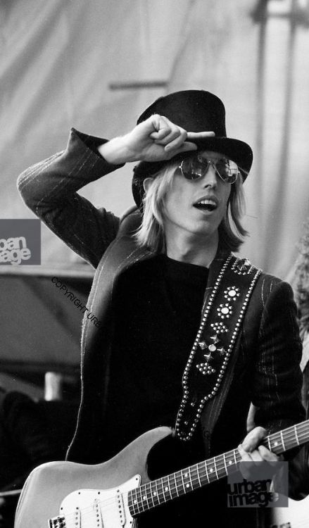 suitejudyblueeyes:  Tom Petty and The Heartbreakers performing on stage   on June 24th 1978  in Knebworth, UK, photographed by Gus Stewart