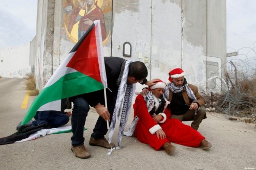 armed with presents Bethlehem Santa grounded by Israeli gas from armed IDF https://www.middleeastmon