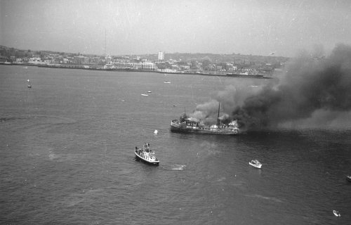 Burning a ship in Elliott Bay, Seattle c. 1950. This Seafair tradition lasted until the 1960s.