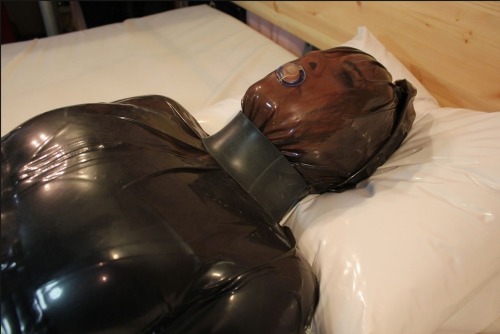 strappyskink: with the valve closed she had no air to breathe in her sticky pvc prisonExquisite sl