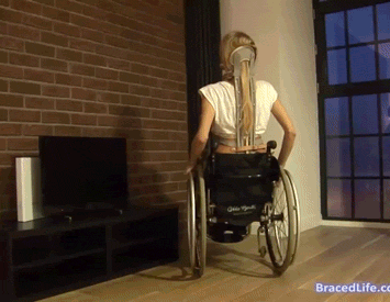 XXX Blonde girl in KAFOs and wheelchair (Para photo