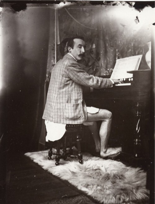 antipahtico:  Paul Gaugin playing the Harmonium ~Alfonse Mucha’s Studio ~ Paris 1895 