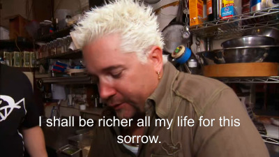 82% sure it's Guy Fieri cooking in a kitchen preparing food. Caption: I shall be richer all my life for this sorrow.
