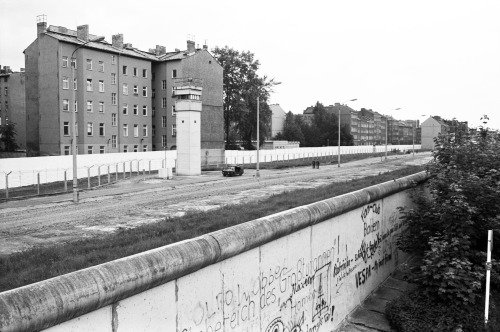 The Berlin Wall seen from further along Bernauer Strasse. Rheinsberger Strasse on the East Berlin si