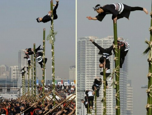 Balancing act: Members of the Edo Firemanship Preservation Association display their balancing skill