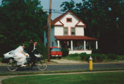 victoriascanlonw:  my mom took this nearly 10 years ago. she was outside and just happened to have her camera when some newlyweds went by on a bicycle for two 