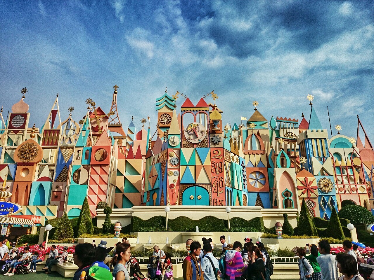 A beautiful sky only adds to the color and wonder of the facade of the It’s a Small World Ride at Tokyo Disneyland.