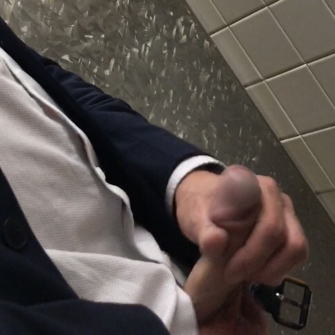 hobartgloryhunter:  gloryholecam:Don’t know why this didn’t post the 1st time. Super hot, bearded, suited, hairy, tatted and lean guy. Jerking it at the urinals. Said no to me blowing at first but as soon as he weakened I jumped down there and he