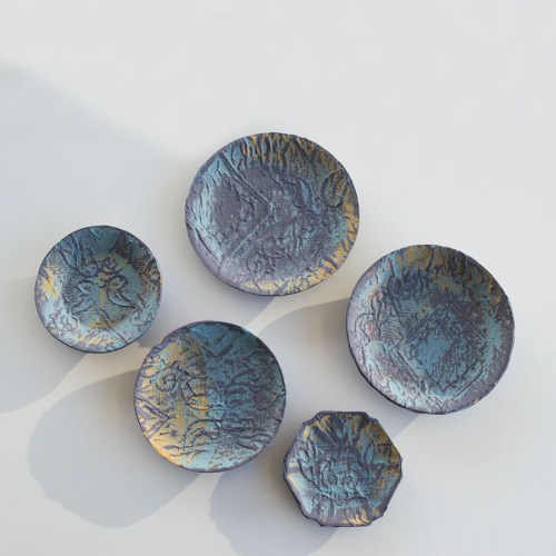 From A Different Cloth - new plates made from coloured stoneware and porcelain.  Textiles from Marce