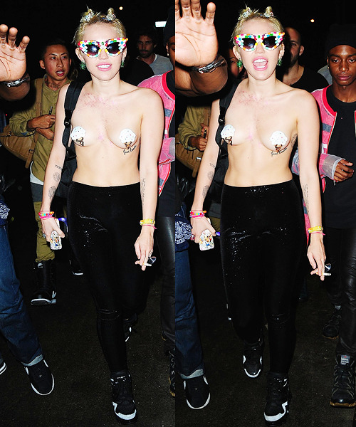 fuckyeahcyrus:  Miley Cyrus arriving at the Alexander Wang New York Fashion Week after party in Brooklyn wearing sunglasses made of pills, ice cream cone pasties and covered in glitter. 