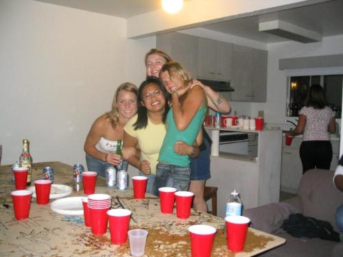 stripgamefan: A wonderful embarrassed strip beer pong game, with a large group of cute girls getting