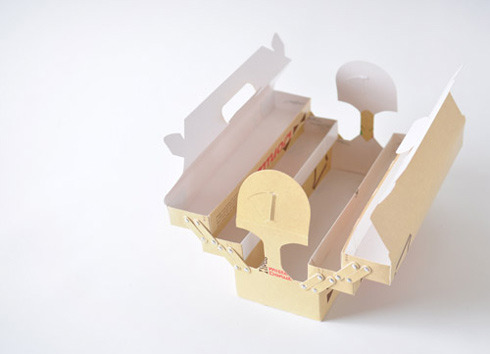 A fun packaging box for Mister Donut, a chain of donut shops in...