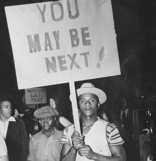 thesociologicalcinema: African-American protesters holding signs reading “You May Be Next&rdqu