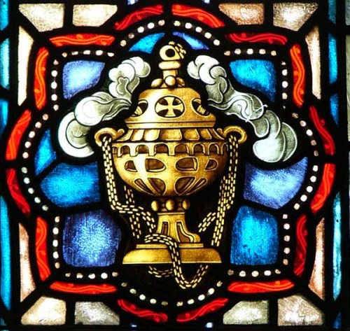 A Thurible Incense burner Stained Glass depiction, in the Apse window of St. Ignatius Church in Ches