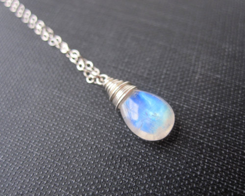 wickedclothes: Rainbow Moonstone Necklace Wire-wrapping techniques are used to fasten this piece of 