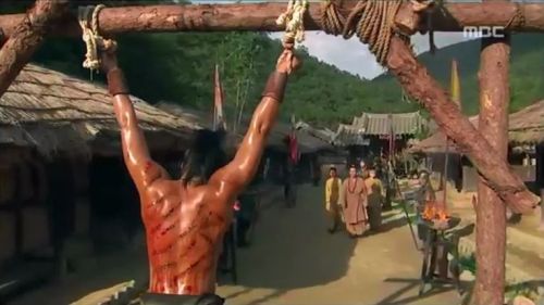 Gyebaek E10 part 2 of 2 In this Korean historical drama, a muscular young man is publicly flogged an
