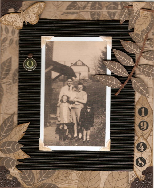 The Quigg Family. I am entering this in Craft Hoarders Anonymous Challenge#13. Lets Cycle, that is Up Cycle. The black corrugated piece has been moved from place to place and recently put on my desk in hopes of inspiration! The paper is one I don’t...