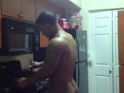 nakedblackmen:  Naked black guy cooking up