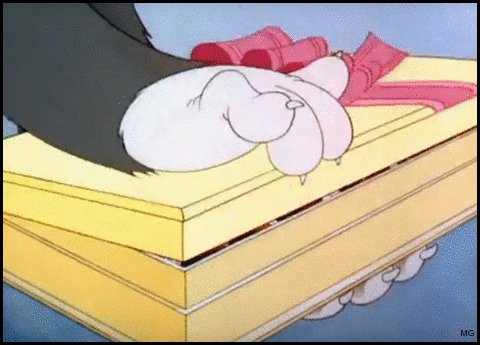  Tom offers Toots some very special candy in “Puss ‘n Toots” (1942) 