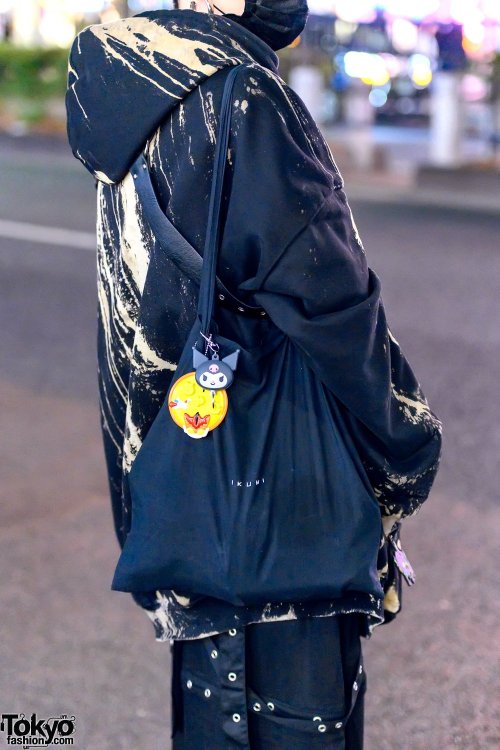 Japanese fashion staffer and freelance model Cham on the street in Harajuku. He&rsquo;s wearing laye