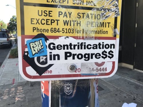 Anti-gentrification stickers in California