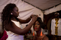 Model, Dakar Fashion week, June 2013. What a beautiful long neck!!! and the outfit in the background...see that.