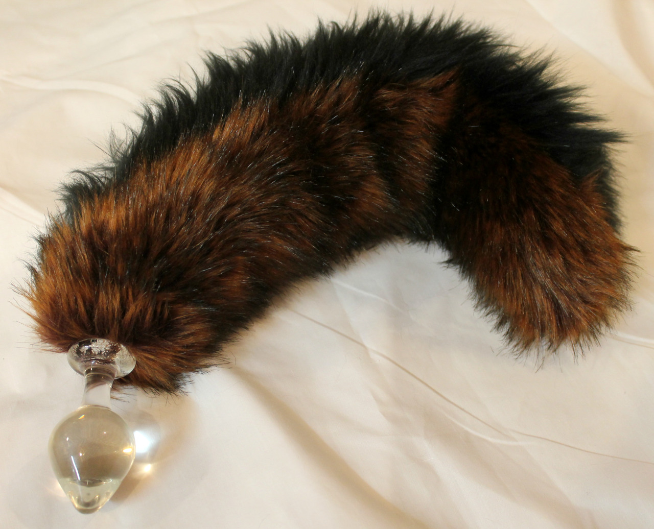 kittensplaypenshop:  Two toned tail in Rust and Black with a permanently attached