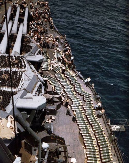 sailnavy:    USS New Mexico’s 14-inch projectiles on starboard deck forward while being replenished at Eniwetok Marshall Islands 30 June 1944 prior to the invasion of Guam.  