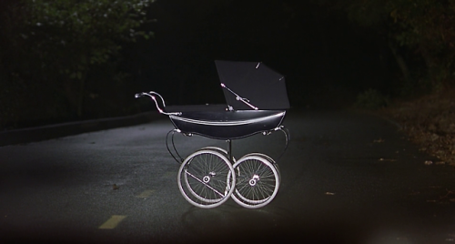 “Shit! What is that?”“It’s a baby carriage.”“I can see it’