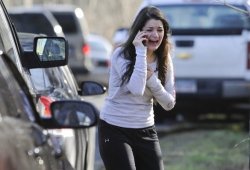 f-launt:  If you haven’t heard, Newtown, Conneticut had a school shooting this morning. At an elementary school. This girl, is waiting to find out if her dad is still alive or not. There are reported 27 dead, 18 of them were children. The parents of