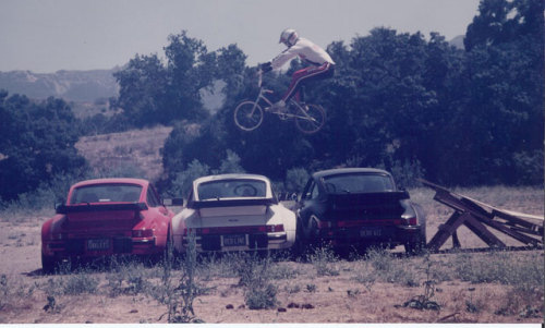 cars-food-life:1983 - Stu Thomsen Jumps Three Porsche’s