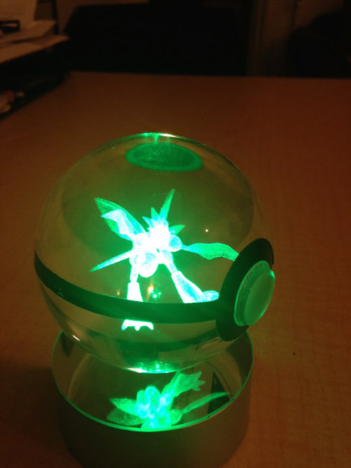 sixpenceee:These crystal Poke Balls hold a 3D etched pokemon inside them that glows with the LED lig