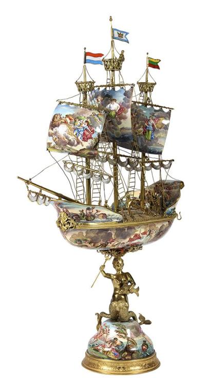 ltwilliammowett:Viennese vermeil and enamel wine Nef, after Herman Bohm, circa 1890 This one is made in two parts, the finely detailed masts, rig, crow’s nests, anchor, and  figures executed in detailed vermeil, the sails enameled with  allegorical