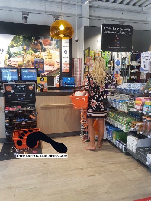 Blonde shopping barefoot