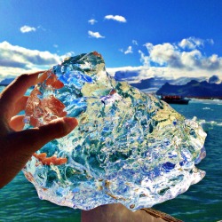 peachnaked:  amandacharchian:  Holding a 10,000 year old piece of ice from the melting glaciers! Iceland.  This is beyond beautiful! What an amazing experience