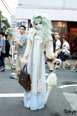 tokyo-fashion:  Minori on the street in Harajuku w/ antique fashion &amp; flower petal makeup. 