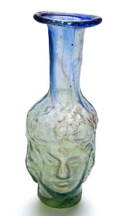 archaicwonder: Roman Glass Head Flask, Circa 1st-2nd Century AD