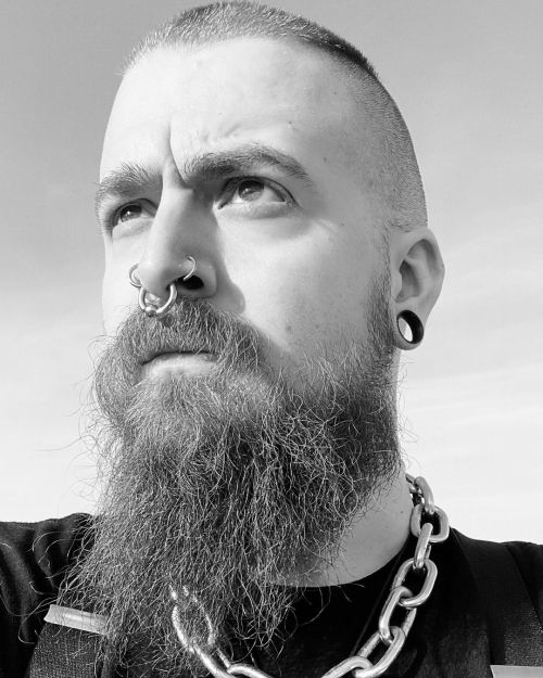 Heavy metal and reflective. #goth #industrial #metal #chains #chainlink #beard #mustache #septum #ga