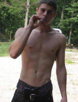 outboundny:  YOUNG HOTTIE TAKING A DEEP DRAW OF SMOKE!