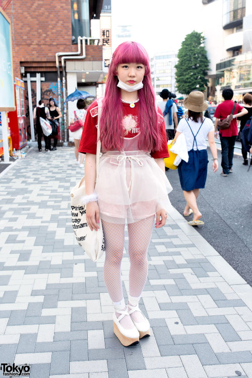 tokyo-fashion: 18-year-old Kaya on Meiji Dori in Harajuku with pink hair, a sheer dress from Bubbles