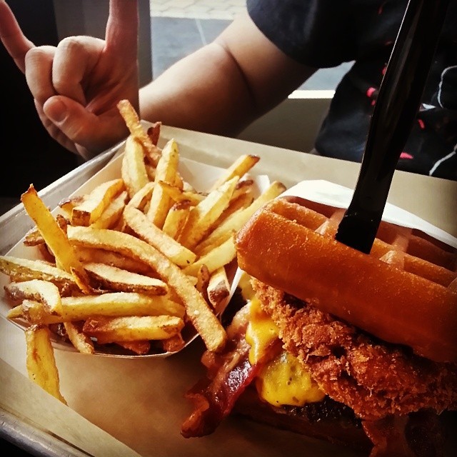 “Jump in the Fryer” burger featuring Cheddar Cheese, Fried Chicken, Bacon, Maple & Hot Sauce Drizzle, with Waffle Buns. From #GrillEmAll #Alhambra. #Latergram #DIZeLAN #DFCNation #DyeCastMetal #SpiralKnuckleStudio #FatKidCity #FoodPorn #BlackOps2...