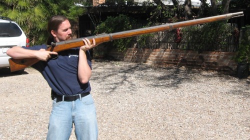 Ian of forgottenweapons.com holding a .60 caliber Chinese bolt action “Jingal” wall gun 