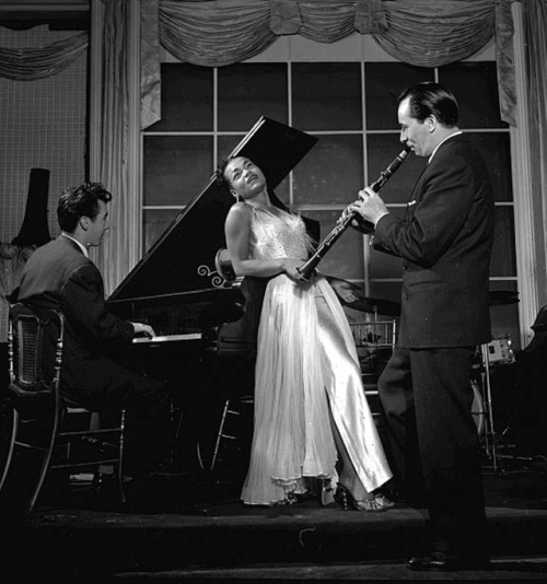 twixnmix:Eartha Kitt and orchestraleader Frank Weir at Churchill’s Club in London, 1951.Photos