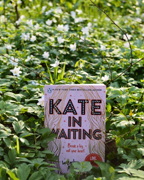 kate in waiting by becky albertalli amidst greenery and white flowers