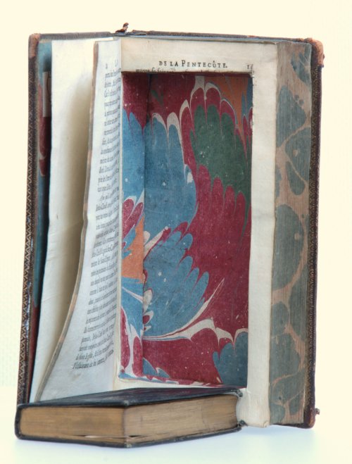 a place to hide something secret - an 18th century book converted into a hiding place