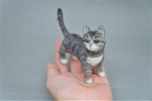 A pair of needle felted tabby cats.  Have a great evening!